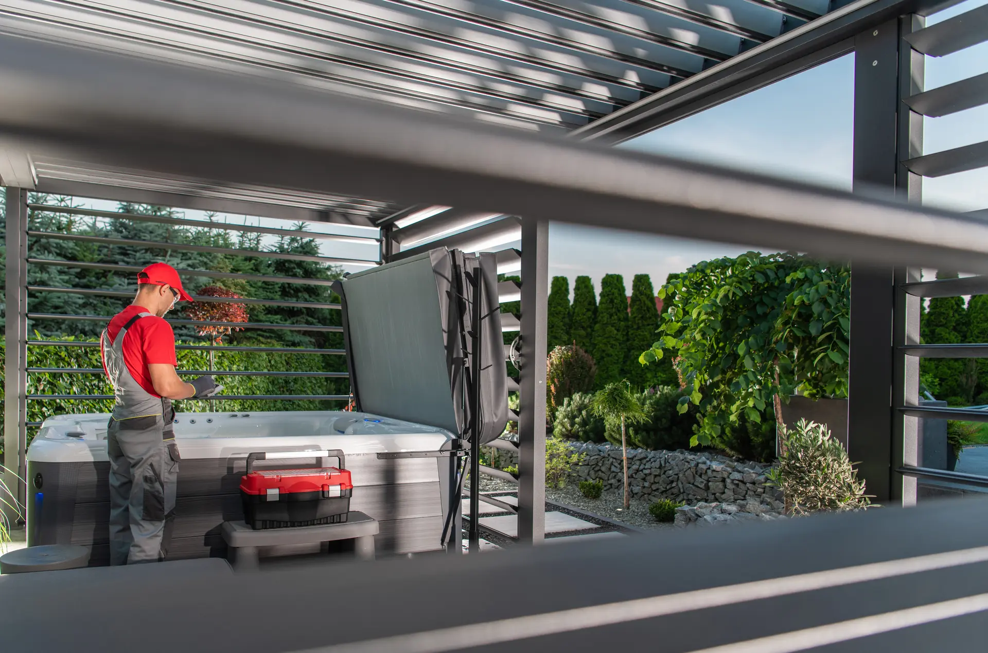 Technician analyzing the efficiency of an installed hot tub